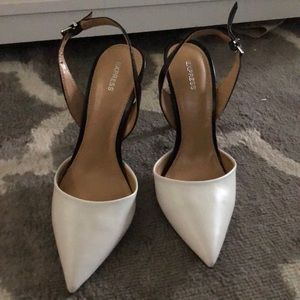 White toed black shoe